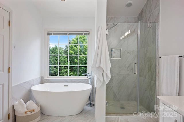 5005 Chestnut Knoll Ln, Charlotte, NC 28269 - full bathroom with a soaking tub, a marble finish shower, vanity, and marble finish floors