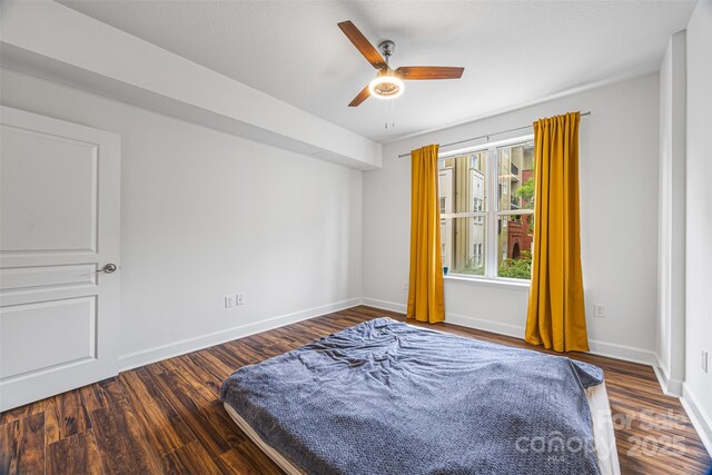 1315 E Blvd Unit 321, Charlotte, NC 28203 - bedroom with wood finished floors and a ceiling fan
