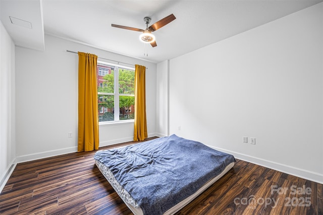 1315 E Blvd Unit 321, Charlotte, NC 28203 - bedroom featuring wood finished floors and a ceiling fan