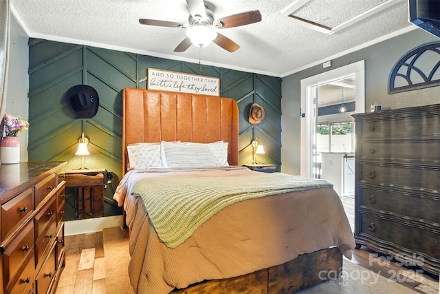 840 10th Street Blvd NW, Hickory, NC 28601 - bedroom featuring a textured ceiling, crown molding, ceiling fan, and wood finished floors