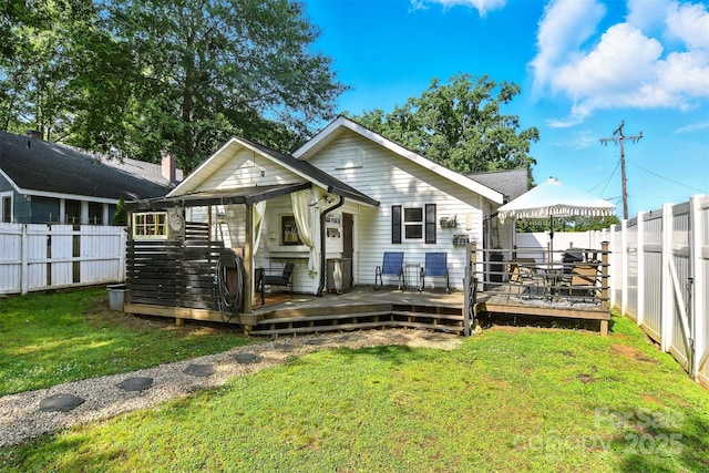 840 10th Street Blvd NW, Hickory, NC 28601 - rear view of property with a fenced backyard and a wooden deck