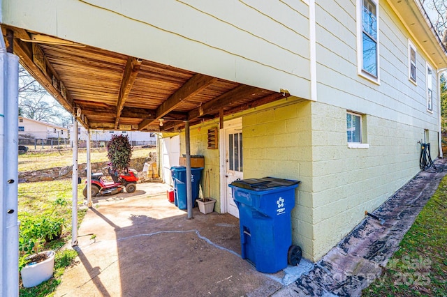 905 Orchard St SW, Valdese, NC 28690 - view of patio / terrace featuring a carport
