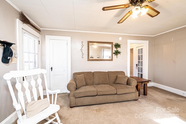 905 Orchard St SW, Valdese, NC 28690 - carpeted living area with a ceiling fan and crown molding