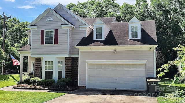 1902 Stonewyck Ave, Kannapolis, NC 28081 - view of front facade with concrete driveway, a shingled roof, an attached garage, and brick siding