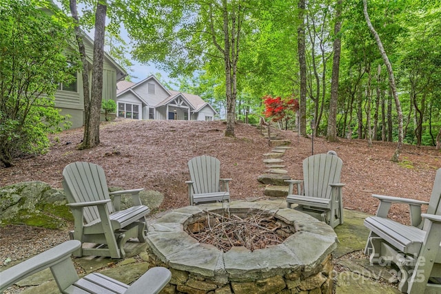 877 Winding Creek Rd, Sapphire, NC 28774 - view of patio / terrace featuring an outdoor fire pit
