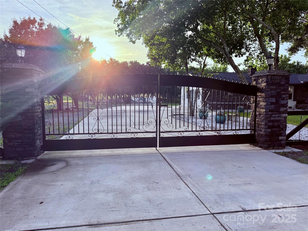 21035 Coley Store Rd, Locust, NC 28097 - view of gate at dusk