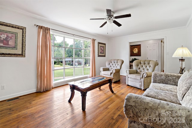 233 Church St, Ellenboro, NC 28040 - living room featuring crown molding, hardwood / wood-style floors, and ceiling fan