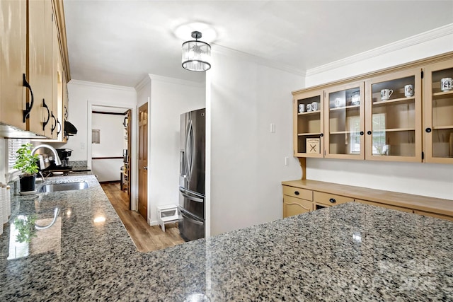 233 Church St, Ellenboro, NC 28040 - kitchen featuring stainless steel fridge with ice dispenser, wood finished floors, ornamental molding, stone countertops, and glass insert cabinets