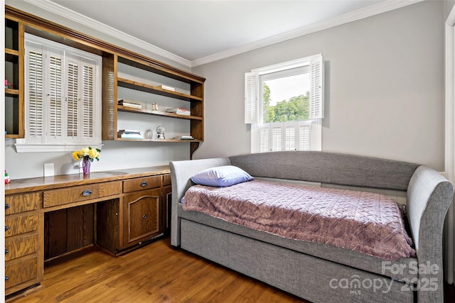 233 Church St, Ellenboro, NC 28040 - bedroom featuring light wood-style flooring and crown molding