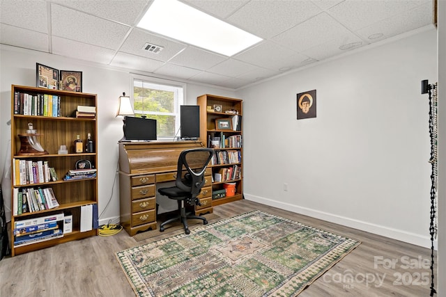 233 Church St, Ellenboro, NC 28040 - home office featuring wood finished floors, a drop ceiling, and crown molding