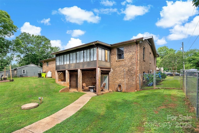 233 Church St, Ellenboro, NC 28040 - rear view of house featuring brick siding and a gate