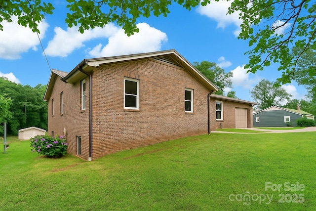 233 Church St, Ellenboro, NC 28040 - rear view of property featuring a yard, a garage, and brick siding
