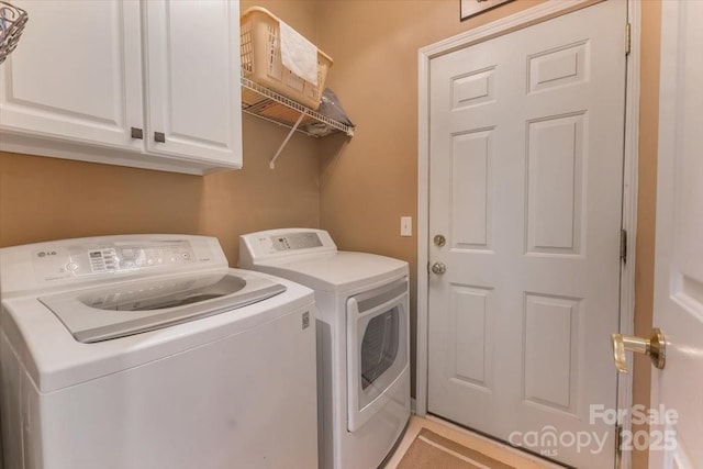 9040 Scottsboro Dr, Huntersville, NC 28078 - laundry area featuring washer and dryer and cabinet space