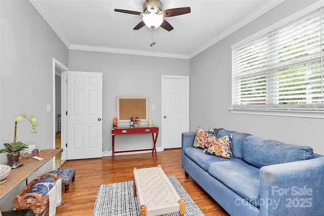 921 NE Dr, Davidson, NC 28036 - living area with a ceiling fan, wood finished floors, and ornamental molding