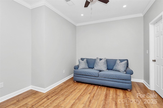 921 NE Dr, Davidson, NC 28036 - sitting room with ceiling fan, light wood finished floors, ornamental molding, and recessed lighting