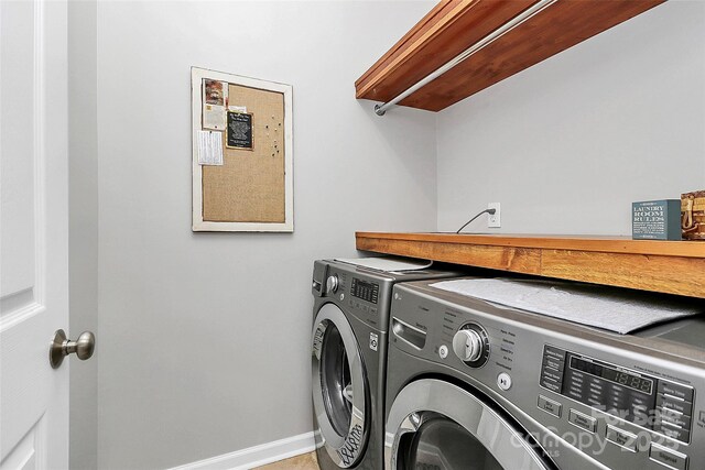 921 NE Dr, Davidson, NC 28036 - laundry area featuring separate washer and dryer and baseboards
