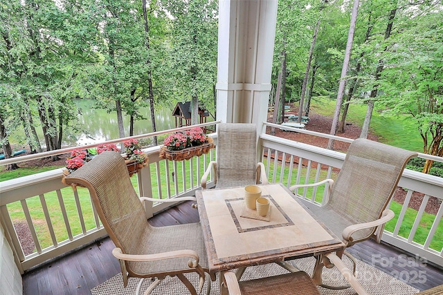 921 NE Dr, Davidson, NC 28036 - wooden terrace with a water view, outdoor dining area, and a lawn