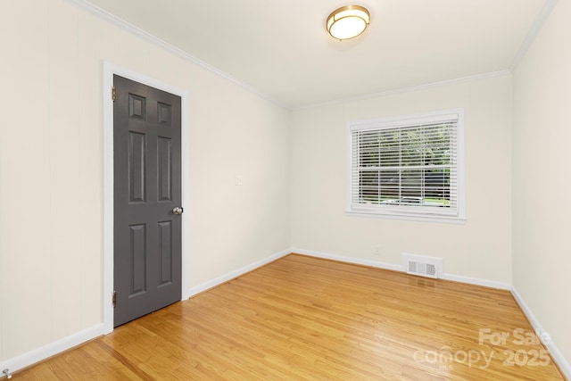 4526 Longwood Dr, Charlotte, NC 28209 - empty room featuring light wood-style floors and crown molding