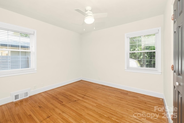 4526 Longwood Dr, Charlotte, NC 28209 - spare room featuring plenty of natural light, light wood-style flooring, and ceiling fan