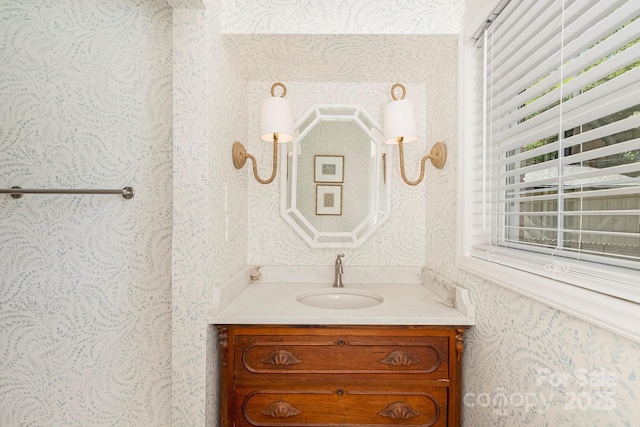 4526 Longwood Dr, Charlotte, NC 28209 - bathroom with wallpapered walls and vanity