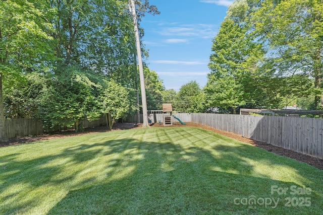 4526 Longwood Dr, Charlotte, NC 28209 - fenced backyard featuring a playground