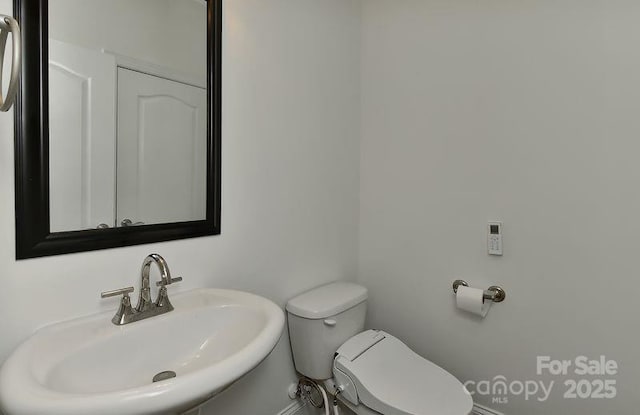 3913 Widgeon Way, Waxhaw, NC 28173 - half bath with a sink and toilet