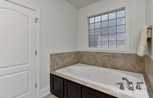 3913 Widgeon Way, Waxhaw, NC 28173 - bathroom featuring a jetted tub