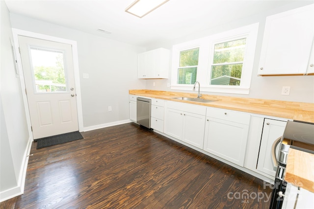 1208 Martin Luther King Ave, Kannapolis, NC 28083 - kitchen featuring wooden counters, stainless steel dishwasher, dark wood-style floors, electric stove, and white cabinetry