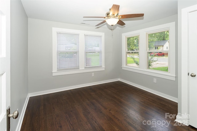 1208 Martin Luther King Ave, Kannapolis, NC 28083 - unfurnished room featuring ceiling fan and dark wood-style floors