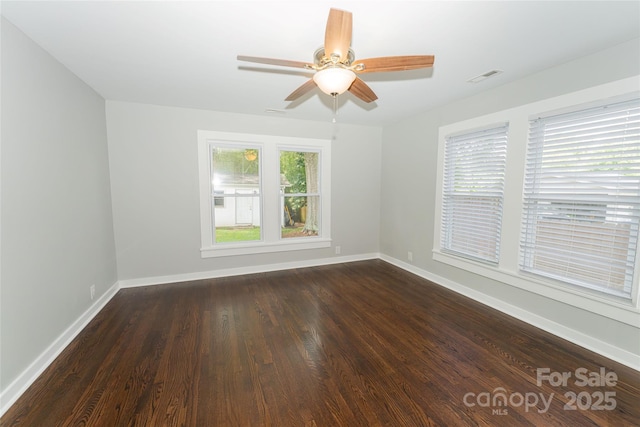 1208 Martin Luther King Ave, Kannapolis, NC 28083 - unfurnished room with dark wood-style floors and a ceiling fan