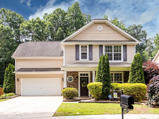 12928 Windy Lea Ln, Huntersville, NC 28078 - view of front of house featuring driveway, stone siding, a front lawn, and roof with shingles