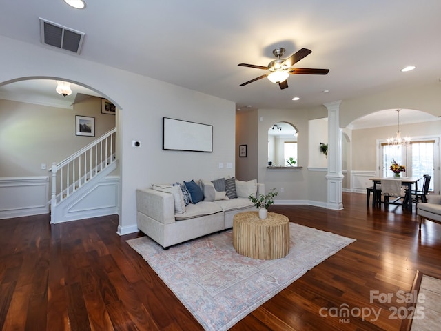 12928 Windy Lea Ln, Huntersville, NC 28078 - living area featuring ceiling fan, wood finished floors, stairway, a decorative wall, and wainscoting