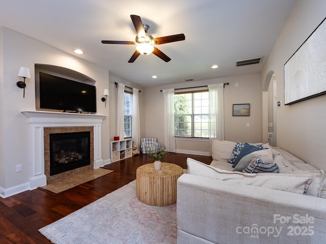 12928 Windy Lea Ln, Huntersville, NC 28078 - living room with a ceiling fan, arched walkways, wood finished floors, a fireplace, and recessed lighting