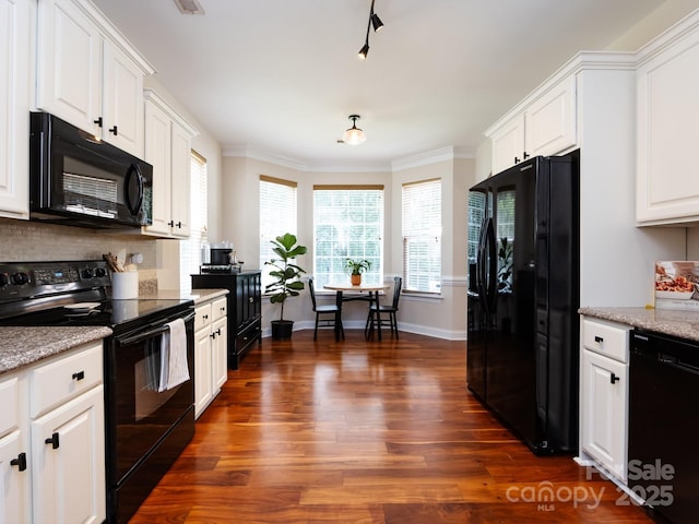12928 Windy Lea Ln, Huntersville, NC 28078 - kitchen with black appliances, dark wood finished floors, white cabinetry, backsplash, and ornamental molding