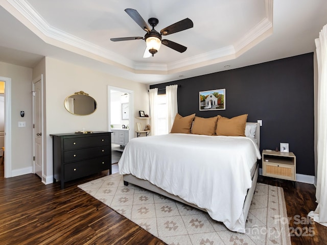 12928 Windy Lea Ln, Huntersville, NC 28078 - bedroom featuring a raised ceiling, wood finished floors, ornamental molding, ensuite bathroom, and a ceiling fan