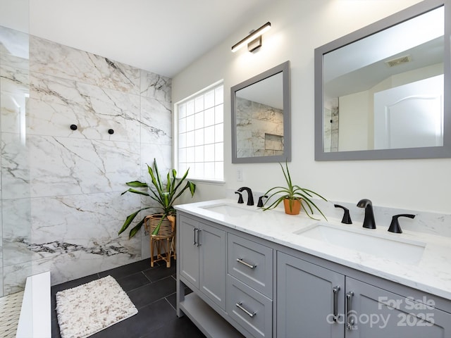 12928 Windy Lea Ln, Huntersville, NC 28078 - bathroom with double vanity, a marble finish shower, and tile patterned floors