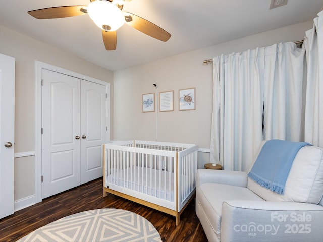 12928 Windy Lea Ln, Huntersville, NC 28078 - bedroom with wood finished floors, a closet, a ceiling fan, and a crib