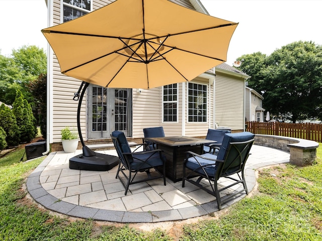 12928 Windy Lea Ln, Huntersville, NC 28078 - view of patio featuring a fire pit and french doors