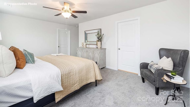 12020 Zazu Way, Charlotte, NC 28215 - bedroom with carpet and ceiling fan