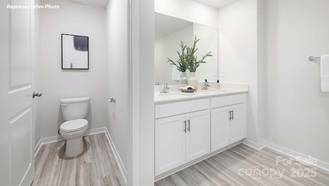 12020 Zazu Way, Charlotte, NC 28215 - full bath featuring wood finished floors and double vanity