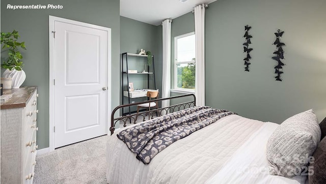 12020 Zazu Way, Charlotte, NC 28215 - carpeted bedroom featuring baseboards