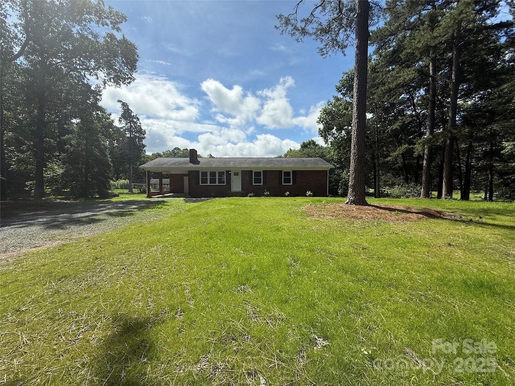 208 Winter St, Richfield, NC 28137 - ranch-style home featuring gravel driveway and a front lawn