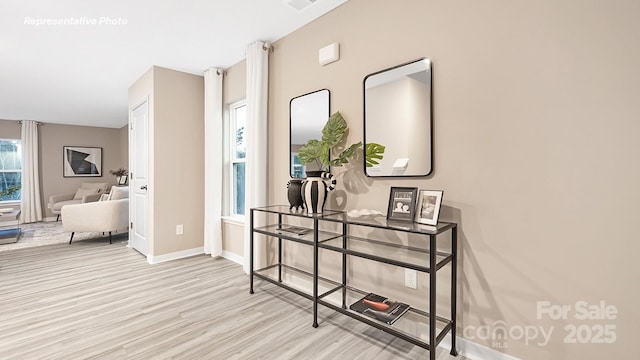 12019 Zazu Way, Charlotte, NC 28215 - corridor with wood finished floors and baseboards
