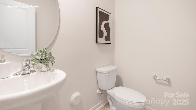 12019 Zazu Way, Charlotte, NC 28215 - bathroom with baseboards