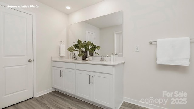 12019 Zazu Way, Charlotte, NC 28215 - full bath with double vanity, recessed lighting, and wood finished floors