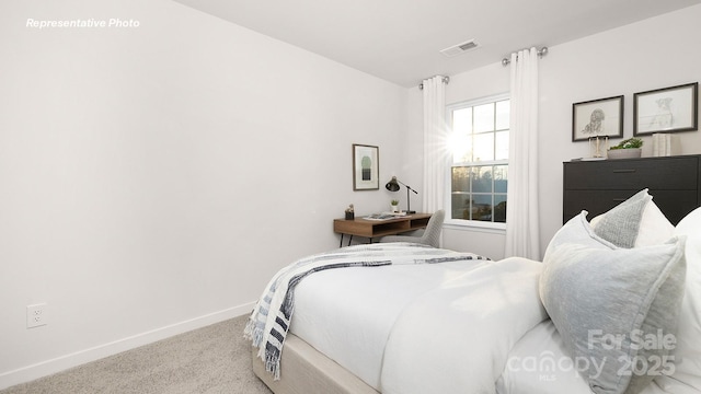 12019 Zazu Way, Charlotte, NC 28215 - carpeted bedroom with baseboards
