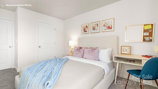 12019 Zazu Way, Charlotte, NC 28215 - carpeted bedroom featuring baseboards