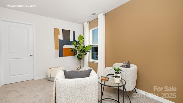 12019 Zazu Way, Charlotte, NC 28215 - living area featuring carpet floors and baseboards