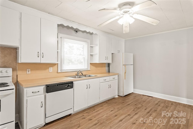 2722 Eastway Dr, Charlotte, NC 28205 - kitchen with white appliances, light countertops, white cabinets, ceiling fan, and light wood finished floors