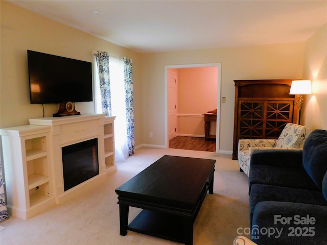 714 Shady Dr, Albemarle, NC 28001 - living area featuring carpet floors and a fireplace